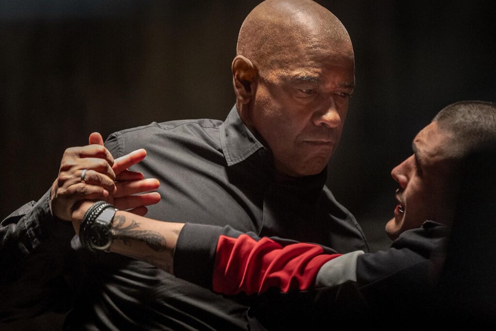 Denzel Washington, Andrea Dodero, and Stefano Montesi in The Equalizer 3 (2023)