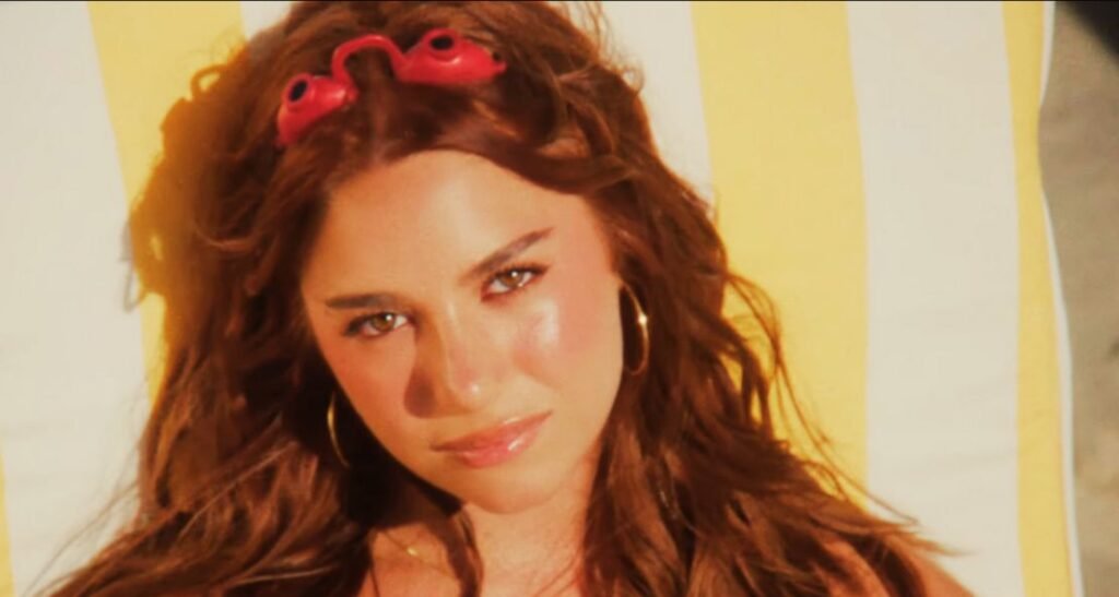 Kenzie “Tan Lines” Official Video: Sunlit Fling with a Johnny Orlando Cameo